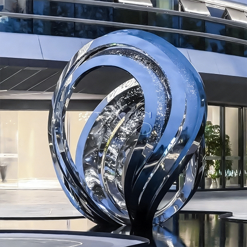 Escultura de anillo entrelazado con espejo de anillos estelares
