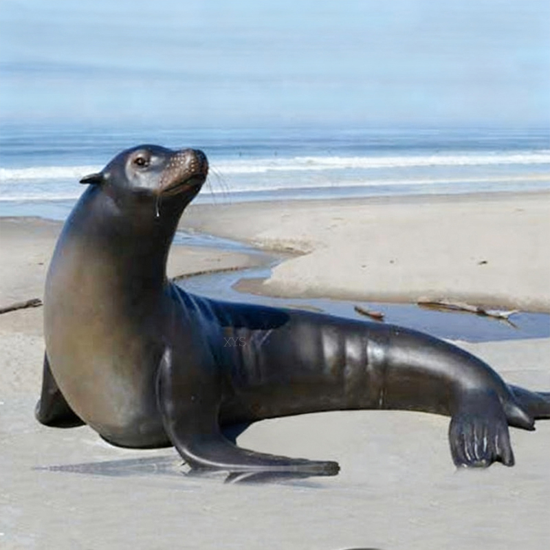 Escultura de león marino de bronce